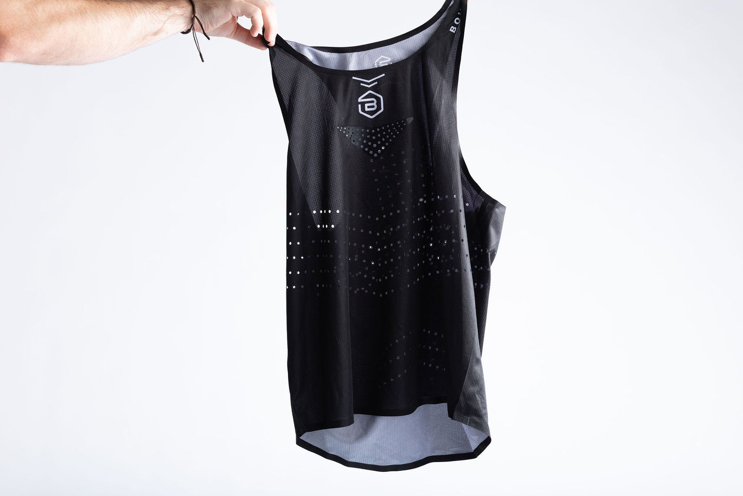 Black PR Singlet held up against white background, full front view