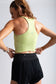 Tempo Crop in Acacia - close-up of the racerback and soft fabric