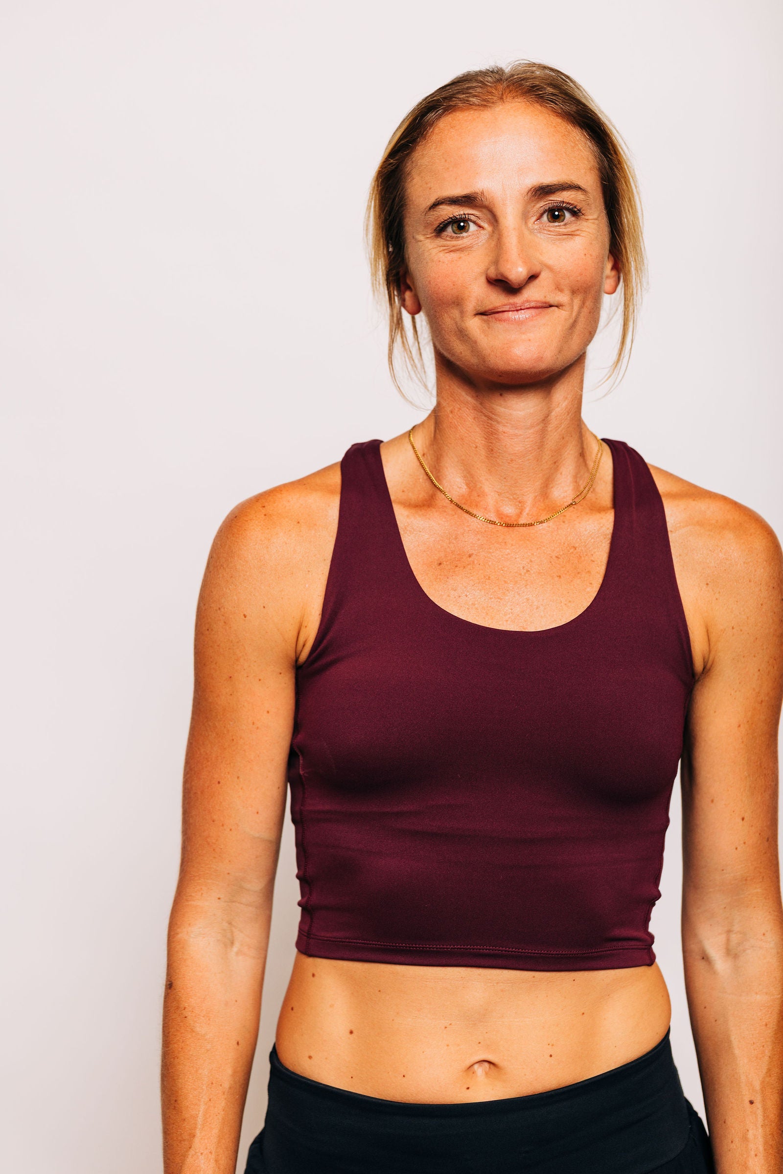 Tempo Crop in Mulberry - close-up of the scoop neckline and fit