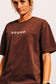 Angled close-up of The Off-Day Tee showing the dropped shoulder and sleeve