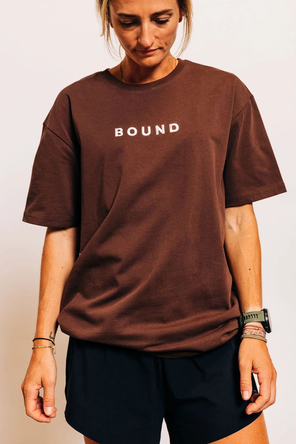 The Off-Day Tee showing body length and boxy fit over running shorts